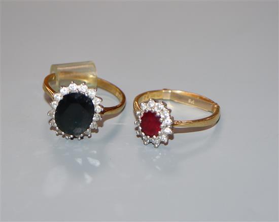 Two 18ct gold and gem set rings, to include a ruby and diamond and sapphire and diamond cluster ring.